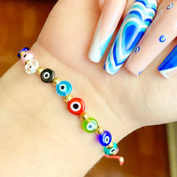 Pulsera ojitos multicolor.