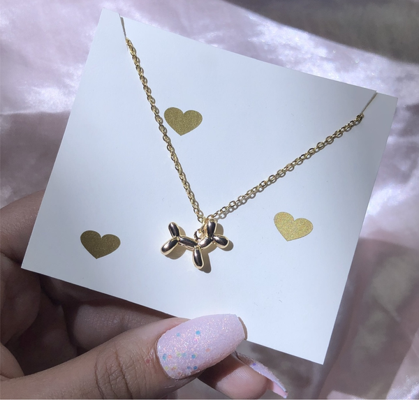 Collar perrito de globo.