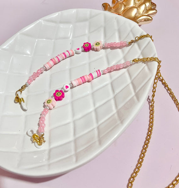 Strap rosa con cadena.